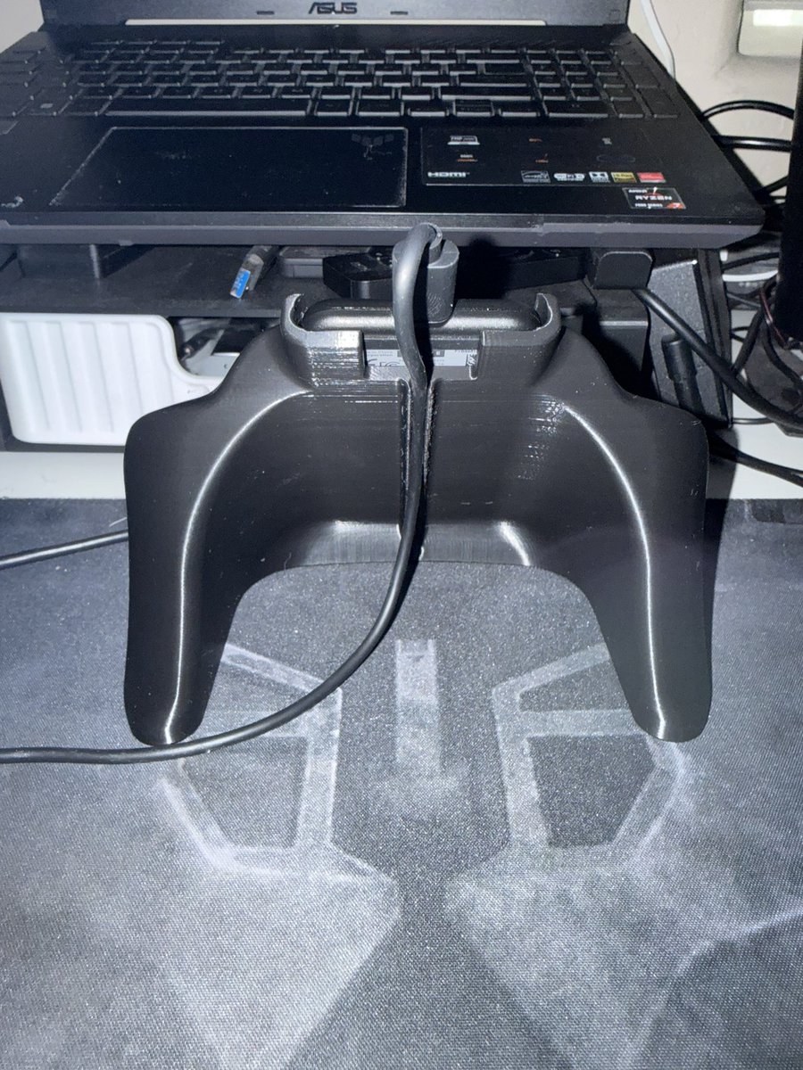 suxor99's tweet photo. 3D printed dock for my Steam Controller! Freaking love it. https://t.co/xggjCDBOik