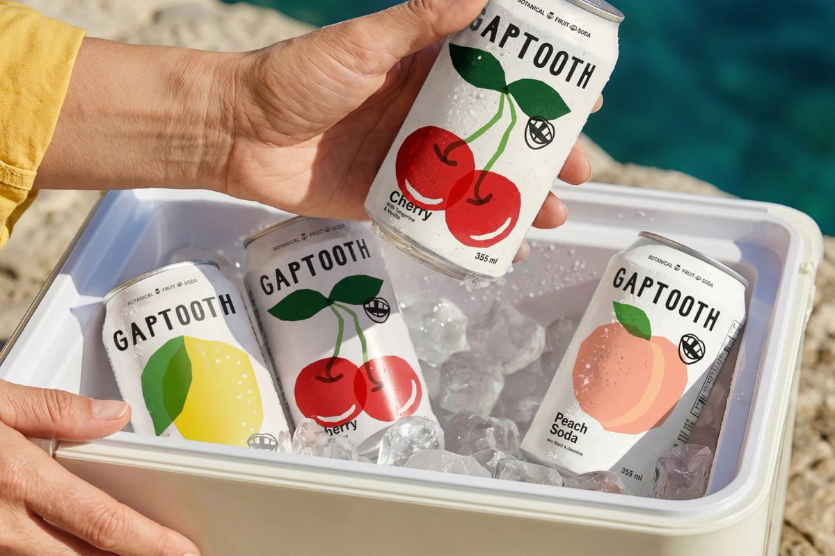 PENTAWARDS's tweet photo. Saint Urban's #packagingdesign for Gaptooth Soda embraces imperfection as a core design principle, using asymmetry, typography, and intentional graphic gaps to create a distinctive visual rhythm. Hand-drawn characters and illustrations add personality. #DailyDesignInspiration https://t.co/Hs9veVXhid