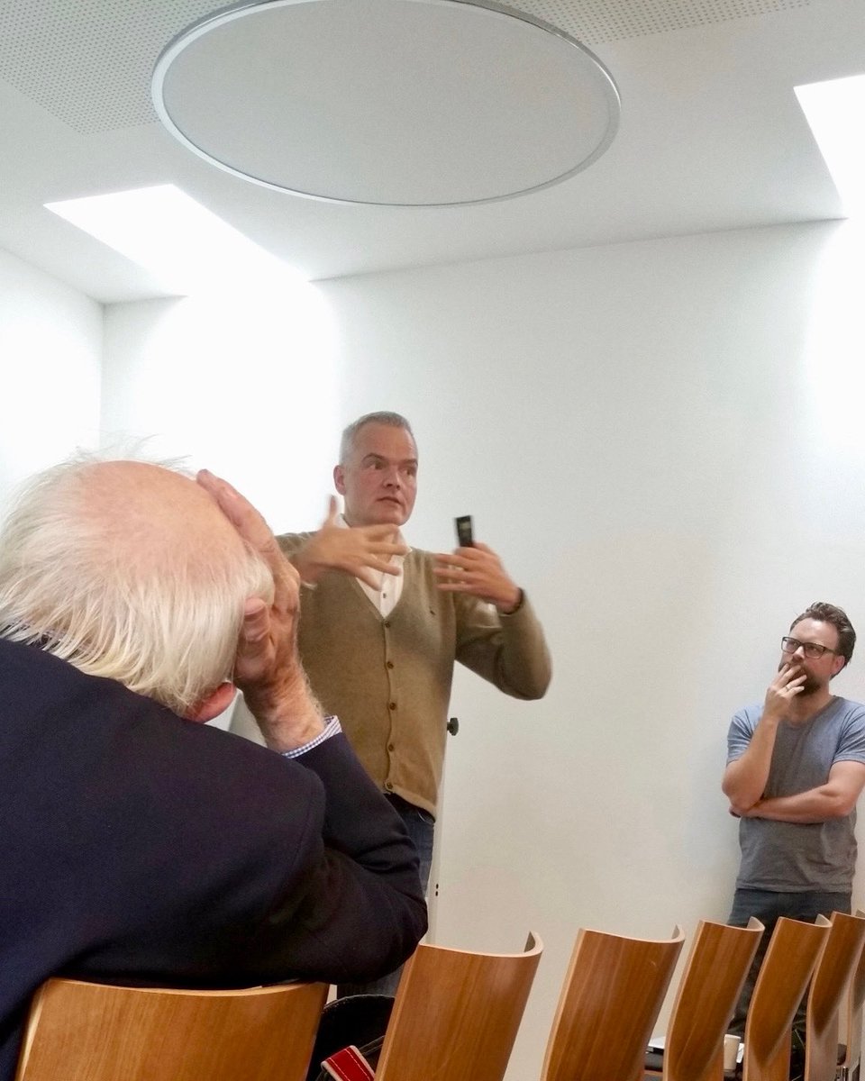 Modemichael's tweet photo. It is not enough to think or write philosophy, it must also be performed.
10 years ago on this day I gave a talk at a workshop organized by Tobias Schlicht around lectures by John Searle, and somebody in the audience took this shot where we all strike archetypal philosophy poses. https://t.co/BkxPn3nRs8