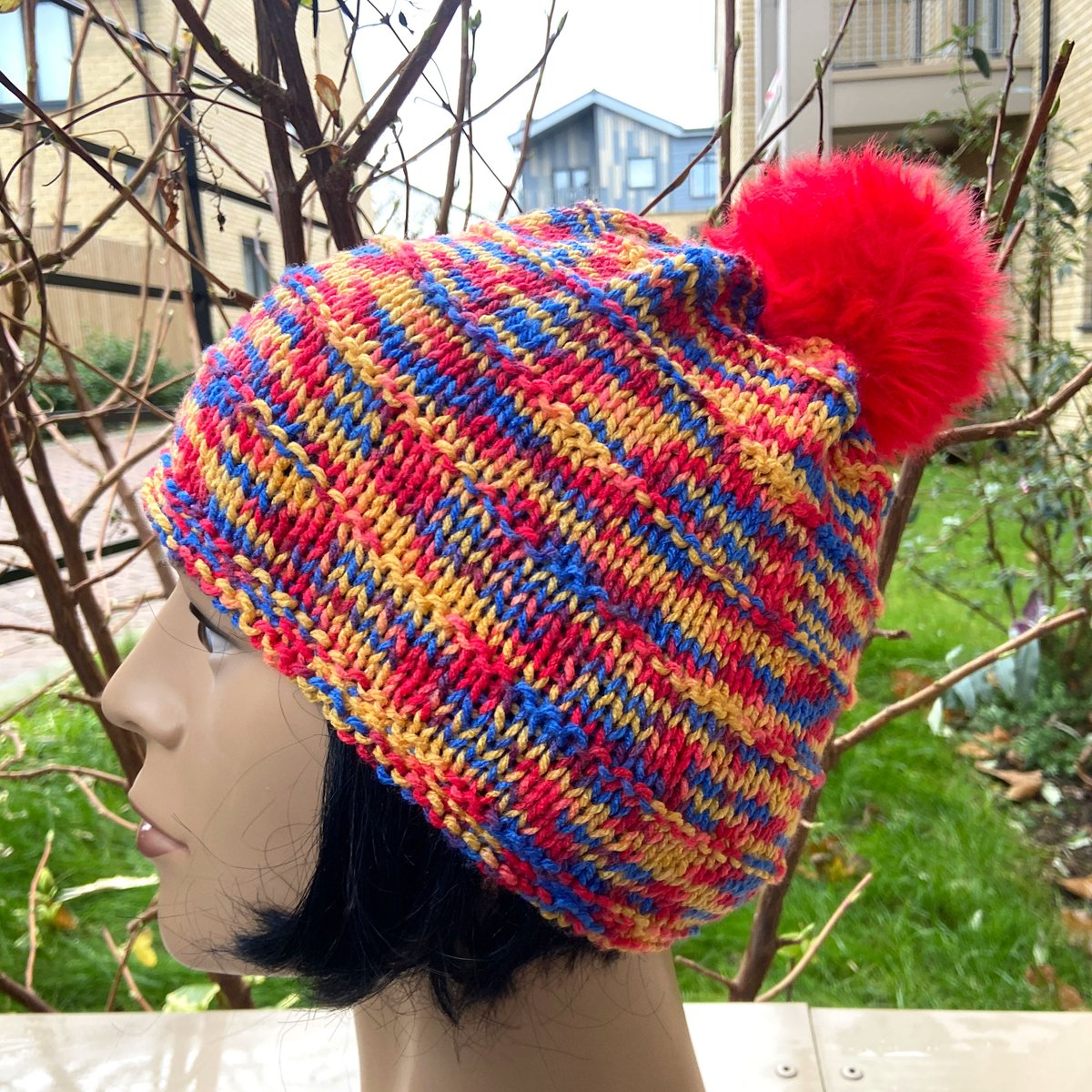 KentCrafts's tweet photo. Hand-knitted bobble beanie: red, yellow and blue pom-pom hat. Price includes tracked 24 UK postage. Available in my Etsy shop at: https://t.co/CyTBtYMMUD #etsyhandmade #etsyseller #etsymaker #etsygifts #handknittedbobblebeanie #pompomhat https://t.co/o6lh4gh0cA