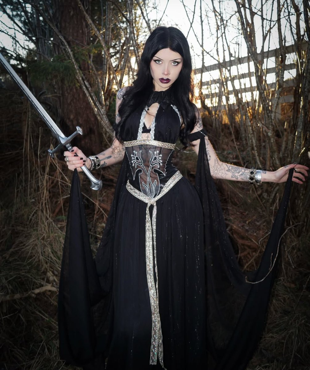 meowcosfashion's tweet photo. 🗡️Enchanted blade in hand, she walks between spell and shadow
📷: @stinestromskag 

#meowcos #GothGirl #goth https://t.co/nBvpgfEgrr