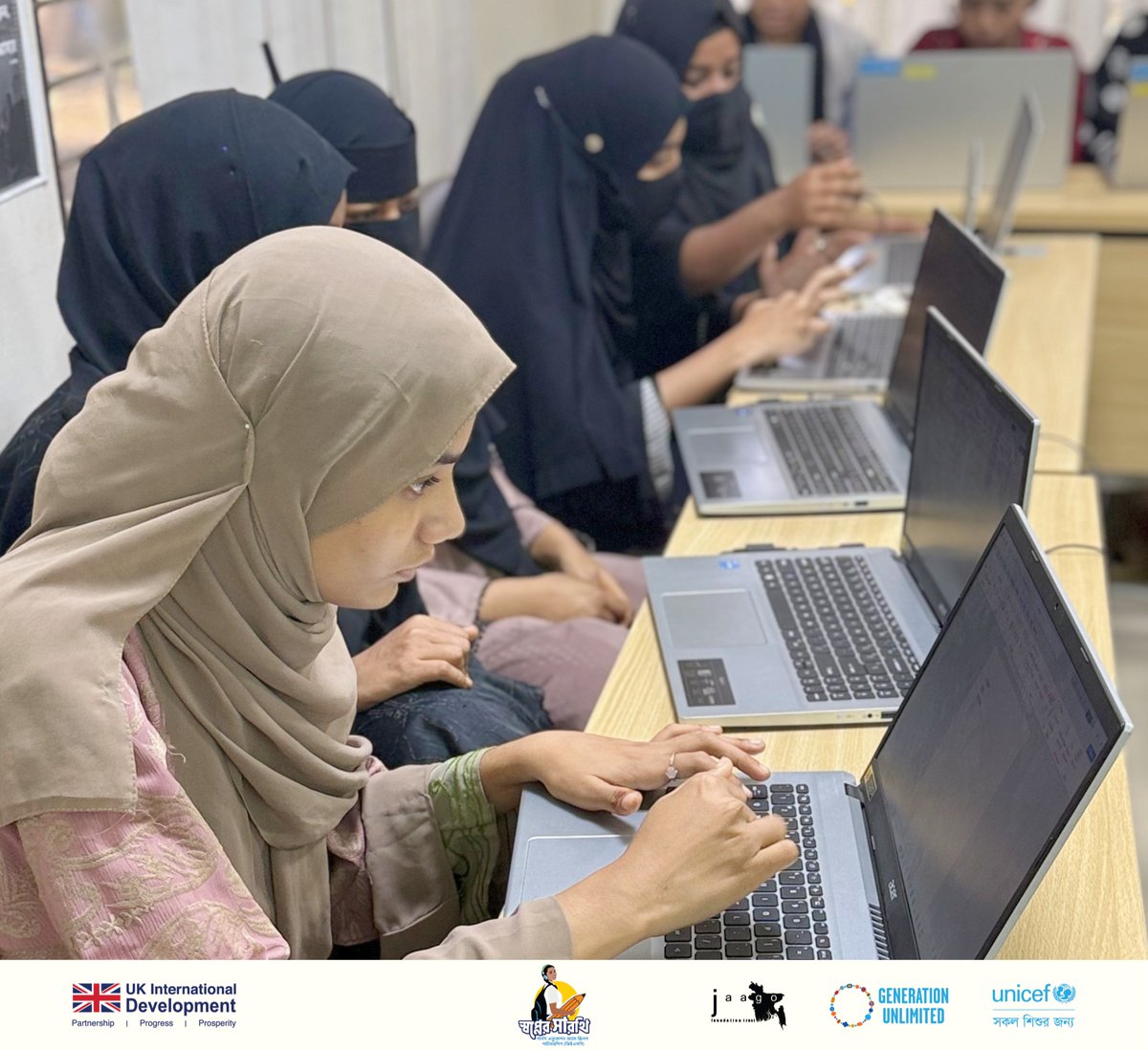 JAAGOFoundation's tweet photo. In Bandarban and Cox’s Bazar, young girls and women are stepping confidently into the digital world through Competency Based Computer Learning training sessions under the Shopner Sharothi–Girls’ Education and Skills Partnership (GESP). 

Through hands-on learning, participants explored essential computer skills, problem-solving, and digital literacy—unlocking new opportunities for education, communication, and future careers. More than just technical training, these sessions are helping young women build confidence, independence, and the courage to dream bigger for their futures.

By creating safe and supportive learning spaces, the initiative is empowering girls to become active learners, future professionals, and changemakers within their communities.

This training is part of the Shopner Sharothi–GESP Project, funded by the Foreign, Commonwealth & Development Office (FCDO), implemented by JAAGO Foundation Trust, and supported by @UNICEFBD.

#ShopnerSharothi #GESP #DigitalSkills #GirlsEmpowerment #YouthEmpowerment #SkillsRightNow #JAAGOFoundationTrust #UNICEFBangladesh