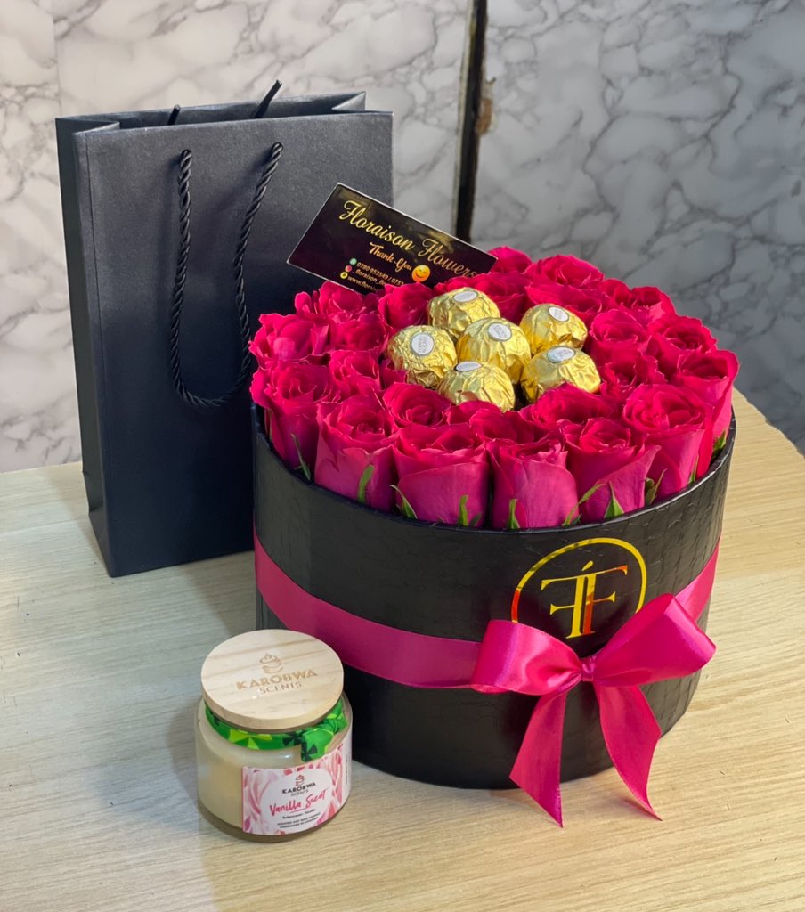 FloraisonF's tweet photo. The ultimate trio: Timeless roses, sweet treats, and a scent to match the mood. Give the gift of a beautiful memory.💖🍬
#floraisonflowers #pinkrose #scentedcandle #flowerskampala #floristkampala https://t.co/w6hvXbLulY