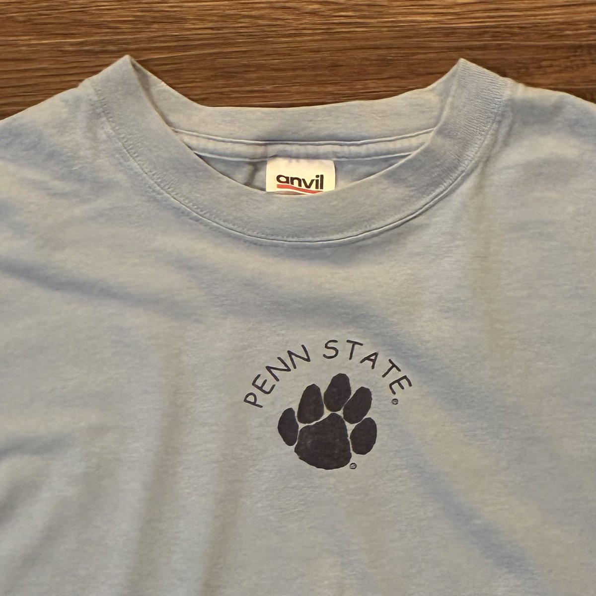 VAULTaged's tweet photo. 🐾 Vintage Penn State heat added to the vault.

Clean minimalist Nittany Lions paw logo tee on a soft light blue Anvil blank. Simple college graphics always hit different when they age right.

Available now through VaultAgedShop — link in bio.

#PennState #NittanyLions #VintageTee #CollegeVintage #NCAA