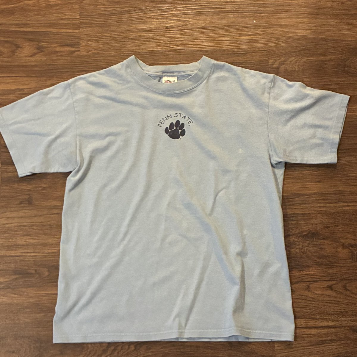 VAULTaged's tweet photo. 🐾 Vintage Penn State heat added to the vault.

Clean minimalist Nittany Lions paw logo tee on a soft light blue Anvil blank. Simple college graphics always hit different when they age right.

Available now through VaultAgedShop — link in bio.

#PennState #NittanyLions #VintageTee #CollegeVintage #NCAA