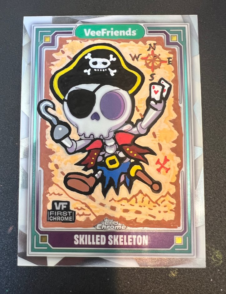 Poker_Pros_NFT's tweet photo. My @veefriends Poker Pirate (access token character) didn't make it into Topps Chrome 1 or 2, but my brother @g3CreativeInc found a way for the Skele to represent him with this @VeeFriendsCards art card! 💚 
#ChromeArtist2027 https://t.co/qSN90fNM0o