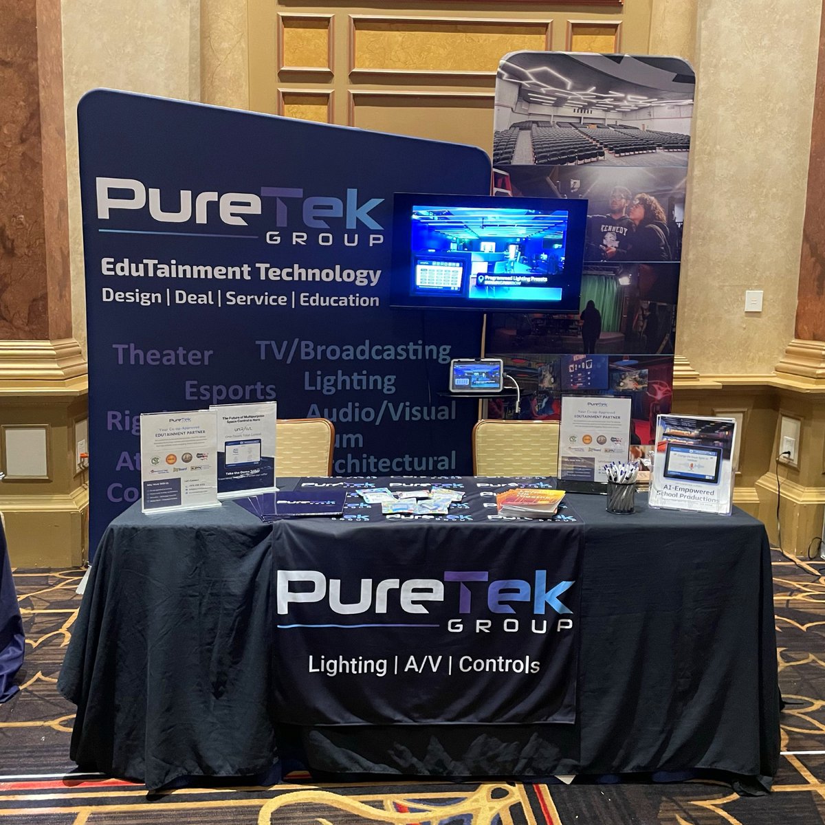 PuretekGroup's tweet photo. Last week in Atlantic City, the PureTek team split between the Spring Leadership Conference at Caesars and an onsite auditorium upgrade featuring new lighting, audio, and our unRAVL platform. We wrapped it all up with a team dinner in AC. #K12Education #unRAVL #EdTech https://t.co/TvMHIcKBMY