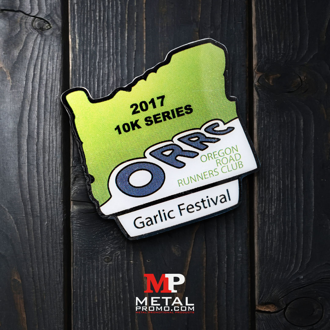 MetalPromo's tweet photo. Mark your milestones with clean, professional craftsmanship. This custom 2017 10K Series lapel pin for the Oregon Road Runners Club Garlic Festival features a precise state outline cut and crisp, durable printing over textured metal. Perfect for clubs, events, and corporate branding that lasts.

SAVE $15 on orders of 75-149, save $25 on orders of 150-299, and save $40 on orders of 300+ pins! Use the code MPLAP26 on our quote form to apply. https://t.co/vfwLhCqY0Q

#MetalPromo #CustomPins #LapelPins #RunningClub #EventBranding
