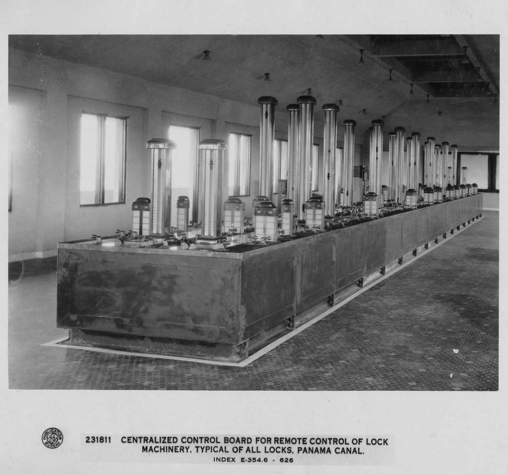 thepanamacanal's tweet photo. Before screens and digital systems, the Panama Canal was operated through physical control boards that functioned almost like a miniature version of the locks. The lock lanes were represented by marble plates, the center wall by cast iron, the gates by bronze bars, and the chain fenders by aluminum replicas. These miniature elements moved at the same speed and angles as the real equipment outside in the locks. Together, the three original control boards weighed approximately 39 tons and required more than 6 million feet of electrical cable, 732 motors, and 464 switches.