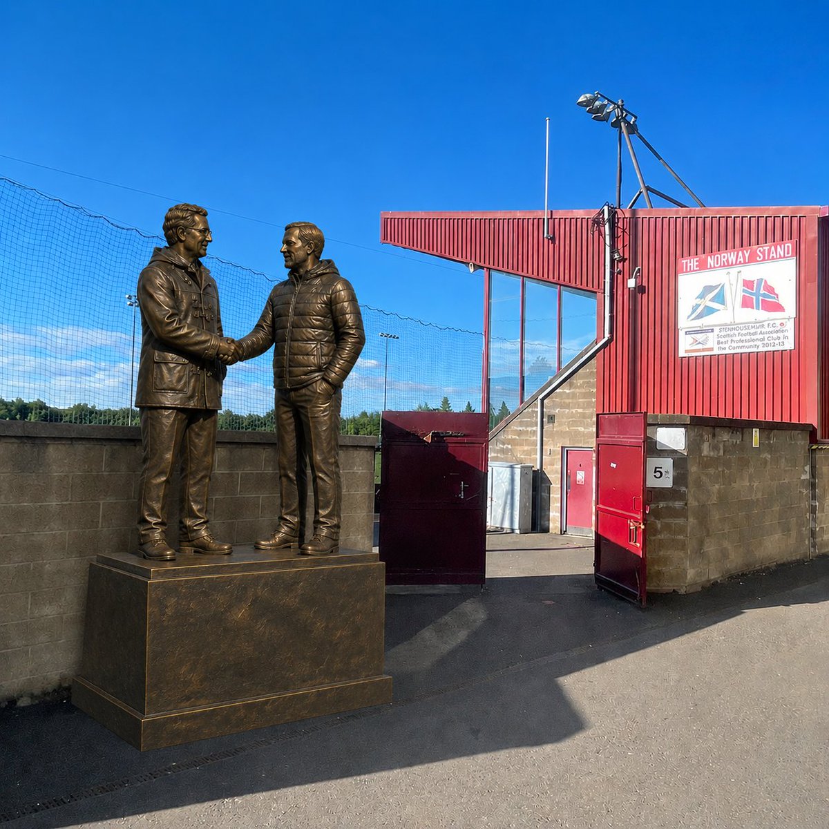 StennyFan's tweet photo. @StenhousemuirFC Let's commission this now. 2 legends. Our first ever trophy led by the great Terry Christie, and our first title led by the brilliant Gary Naysmith. Looks good in front of Ochilview. https://t.co/X6bnaCS0kg