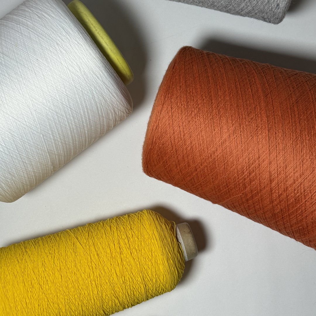 StudioKMD's tweet photo. Yarn selection plays a critical role in textile development. Variables like color, material, and denier affect performance, structure, and hand feel. At Studio KMD, we evaluate yarns early in the process to ensure materials align with the intended function and final application. https://t.co/PzL92LRrap