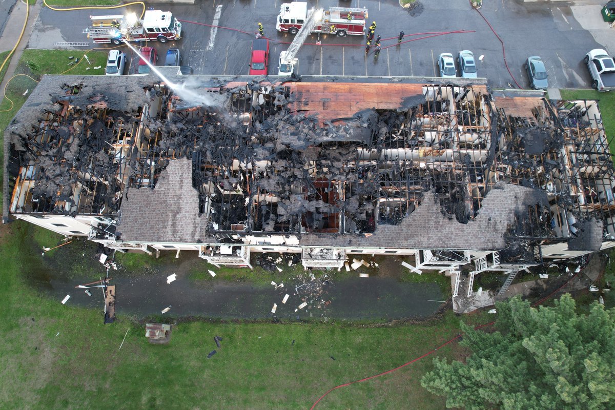 NFSAorg's tweet photo. A Tale of Two Fires: Why #FireSprinklers Matter-Over the weekend, we saw firsthand how fire sprinklers make a life-altering difference. Saturday: A cooking fire extended into a kitchen cabinet. Because this building was retrofitted with a sprinkler system in 2017, a single sprinkler contained the fire instantly. The damage was minimal, the system was quickly reset, and residents experienced almost zero disruption. Monday: A devastating fire struck a different building—this one without a sprinkler system. While we are incredibly thankful no lives were lost, the building was destroyed, and multiple families lost everything that made their apartment "home" Both bldgs were built before modern codes, but the bldg w/retrofitted sprinklers completely changed the narrative. Thanks to @DSMFireDept Fire Officials for sending us this great example of the #fastestwater difference!