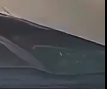 Ari98____'s tweet photo. @catturd2 Average Boomer in the comments down here don't see that the ending is clearly ai:

The reflection of the sign above the car changes while the car is standing still. 

And the reflection is super wrong all the time.

But yeah 'merica lets get em!! 🤣 https://t.co/yBkcDz9Nti