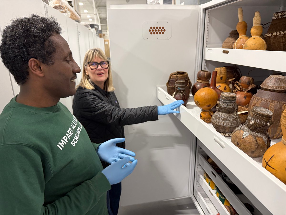 MSUMuseum's tweet photo. Behind the scenes! Dr. Fikadu Reta Alemayehu, senior academic specialist with MSU’s Impart Alliance, recently explored the MSU Museum’s Ethiopian collections with Lynne Swanson as part of ongoing efforts to reconnect communities, scholars, and students with these collections. https://t.co/i3wSlC0lCn