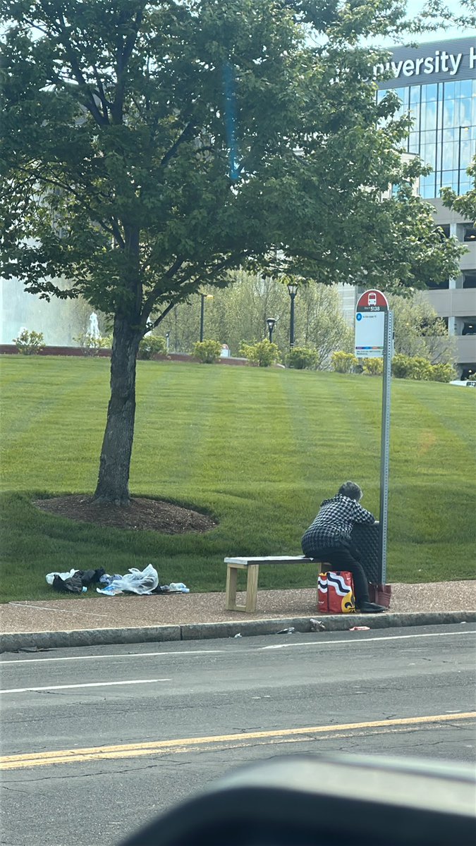 DiabloPacket's tweet photo. Just watched a real master at work. Dude rolls up to the bus stop, unfolds a (what I’m assuming is homemade) 4 person bench, sits on the end and starts vomiting in a trash can. 

Pretty sure he’s out cold rn https://t.co/nVMR4p8s9u