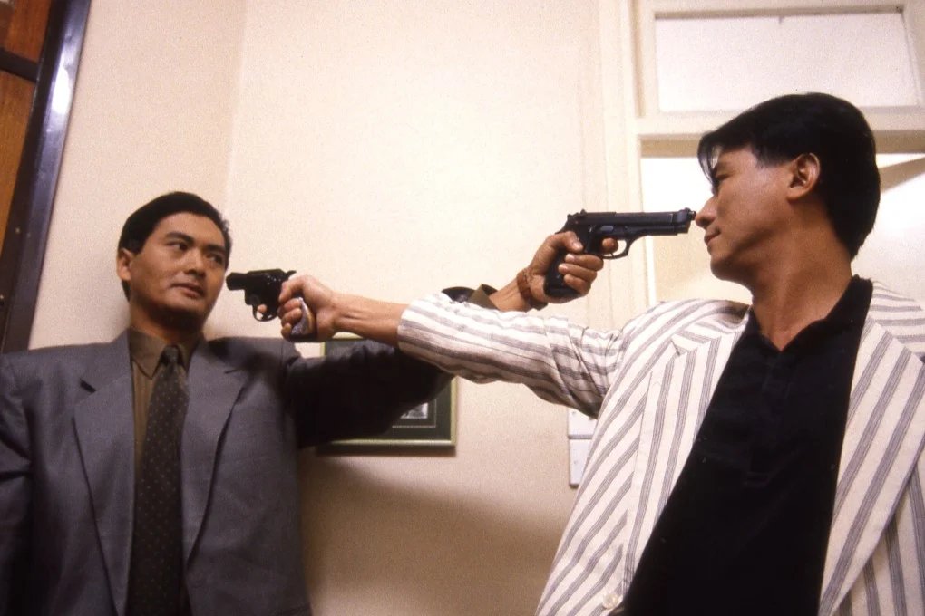 CPXMCR's tweet photo. Drawn from influences as diverse as French crime to American drama, the film uses slow-motion gun battles and punctuated silences to map inner conflict onto the city’s material spaces. Don’t miss The Killer in 4K Fri 29th May! https://t.co/A2NOpFAUqu https://t.co/GH4ZZwTJ0B