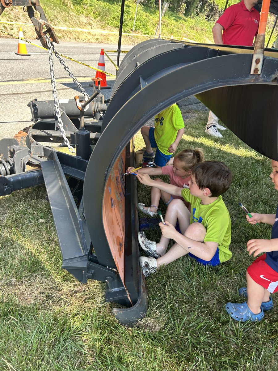 AACoDPW's tweet photo. Children are letting their creativity shine in the spring sun by decorating our plow! DPW, in conjunction with Leadership Anne Arundel, is at today’s Blue Angels show, located just off Route 450 near the Maryland World War II Memorial. So, stop by! https://t.co/ZQyePJBWHc