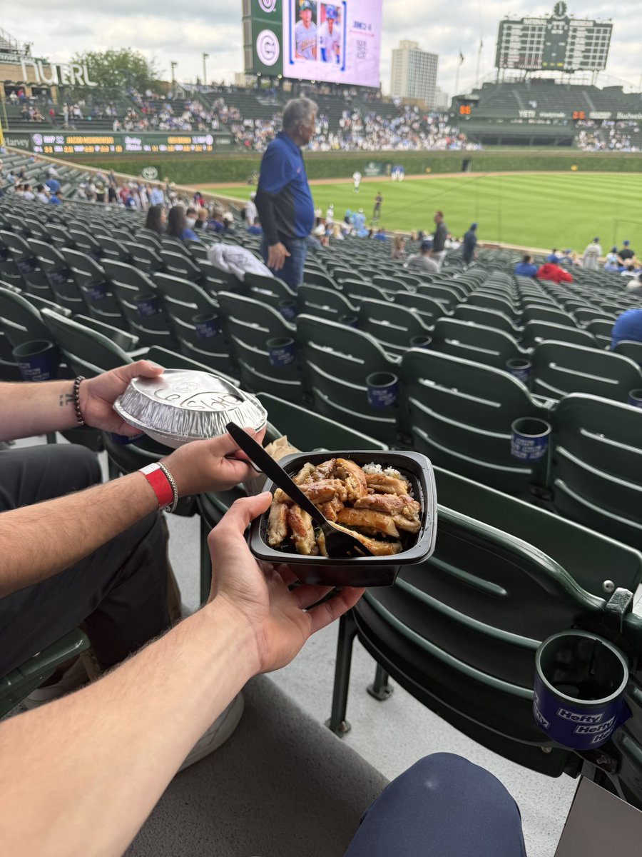 Big10Truther69's tweet photo. You can’t say Wrigley isn’t diverse. A taste of Tokyo and Tijuana in section 108 #Panda #Chipper https://t.co/Kl3Ts258dT