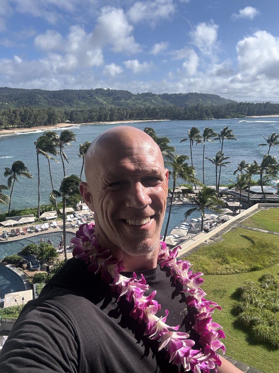 BobbyMaximus's tweet photo. Am I doing Hawaii right @TheRock? Bald, jacked, and Lei’d https://t.co/1aDN8HVFr2