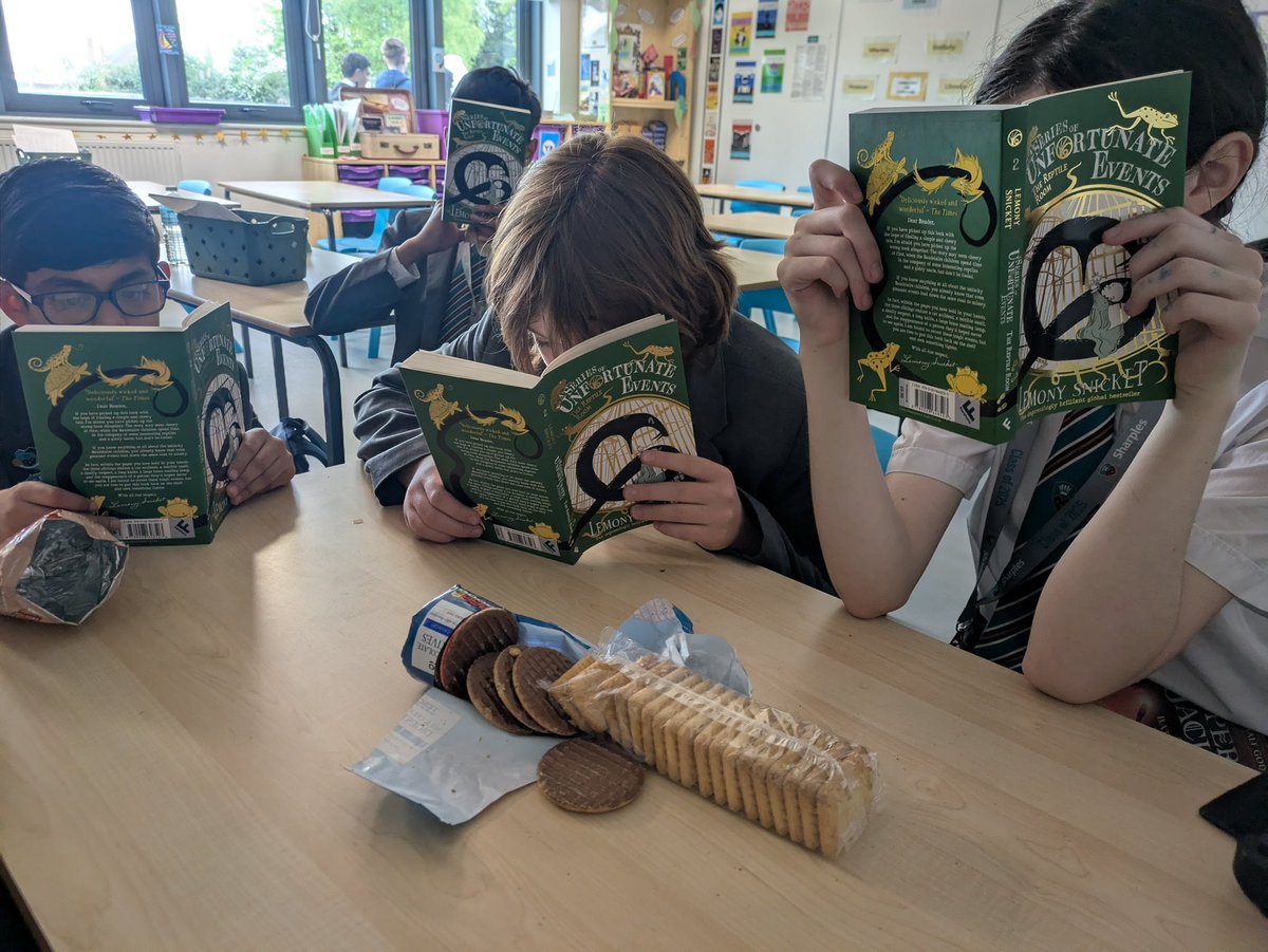 SharplesBacc's tweet photo. Students got their teeth into a new book (and biscuits!) at the weekly Books and Biscuits Club today!
The Y7 students enjoyed the first novel in the Series of Unfortunate Events in their form time, so they asked if they could read the next book, The Reptile Room in the club! 📚🍪 https://t.co/3ZvyScRR5b