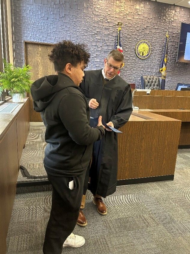 PSCNeb's tweet photo. On May 6, 2026, the Douglas County Young Adult Court held a graduation ceremony at the Douglas County Courthouse in Omaha, with Judge James Masteller presiding. https://t.co/6YCbhM2dB3 https://t.co/uKAFEEcEGW
