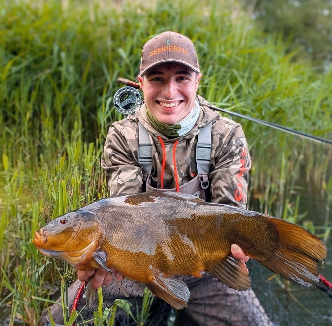 semperfli's tweet photo. What a fish! Ethan Rush is no stranger when it comes to targeting Tench on the fly but he never thought he'd land one this big! Great fish Ethan, well done! 

Want a hat like Ethan's 👉 https://t.co/anVDjRZAZ5

#semperfli #semperfliproteam #flytying https://t.co/ZFxqkOjHas