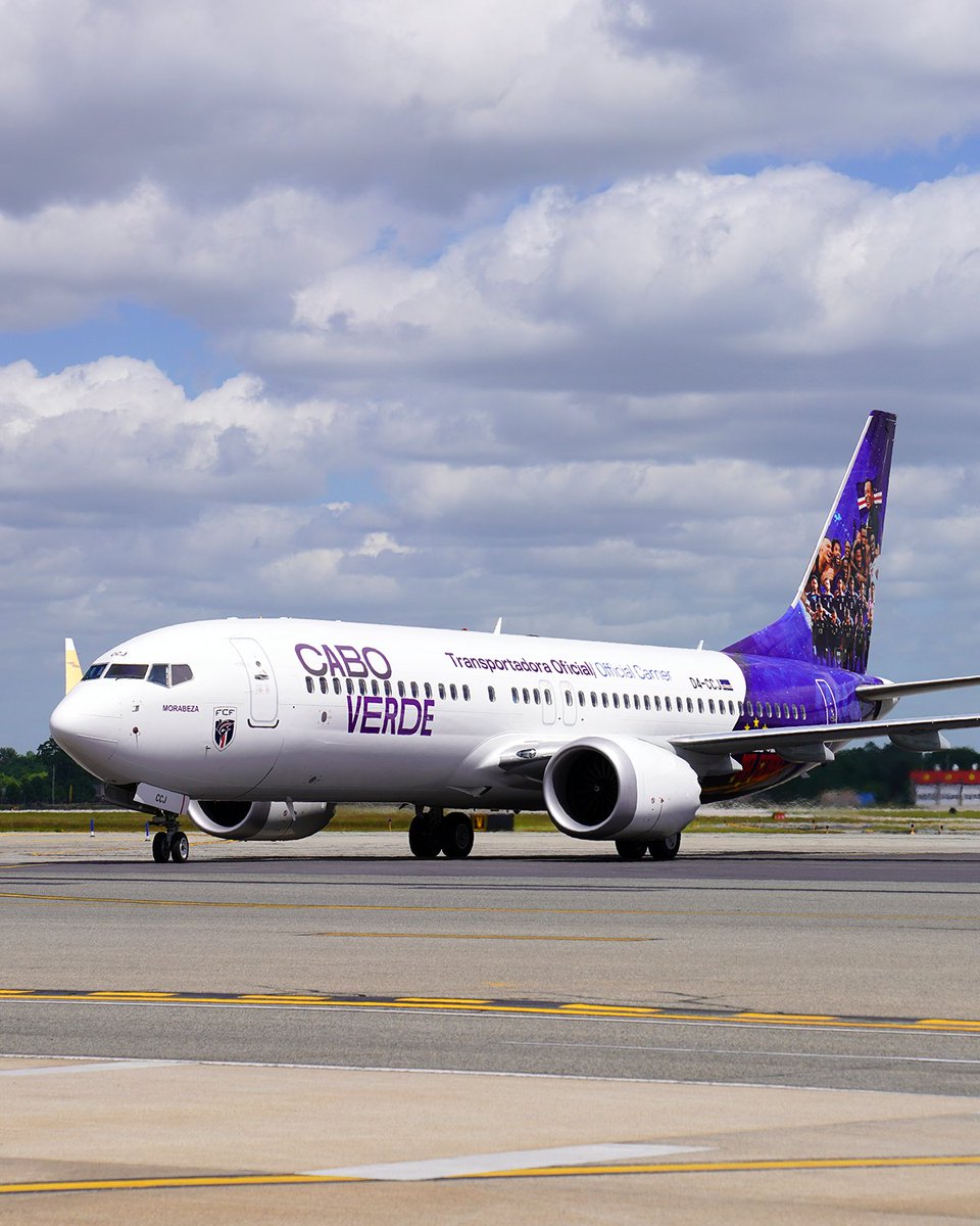 IFlyRhodeIsland's tweet photo. Spotted at PVD! The new look on this @cvairlines Boeing 737 MAX 8 highlights @fcfcomunica and the 2026 World Cup. βοΈβ½ #FlyRI #CaboVerdeAirlines https://t.co/T8O9qNRrsR