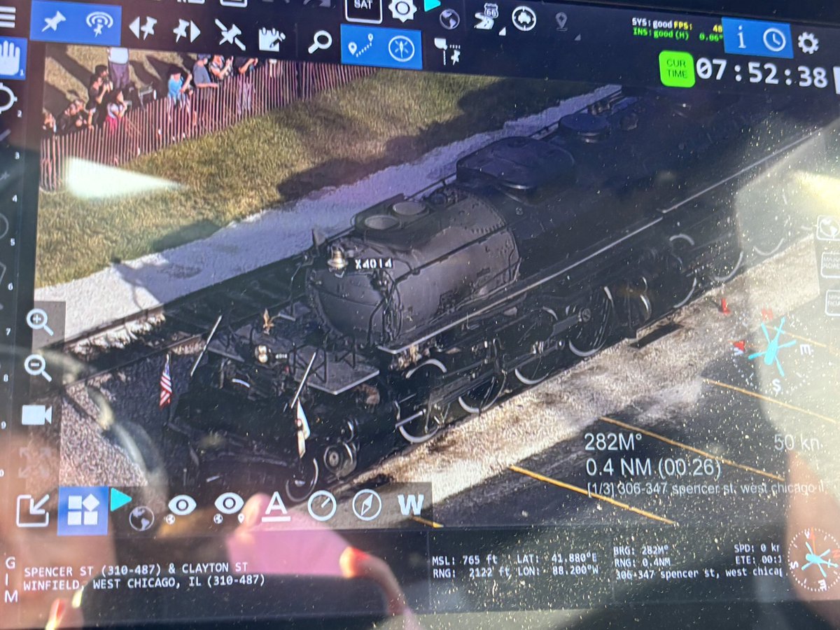 CourtSpinelliTV's tweet photo. Oh, boy! 🚂 The Big Boy No. 4014 is getting ready to depart West Chicago on its coast-to-coast tour. There’s quite a crowd out here on an overpass and along the tracks to give it a send off. This monster is the world’s largest operating steam locomotive! @WGNNews @WGNMorningNews https://t.co/zuA9OQYH19