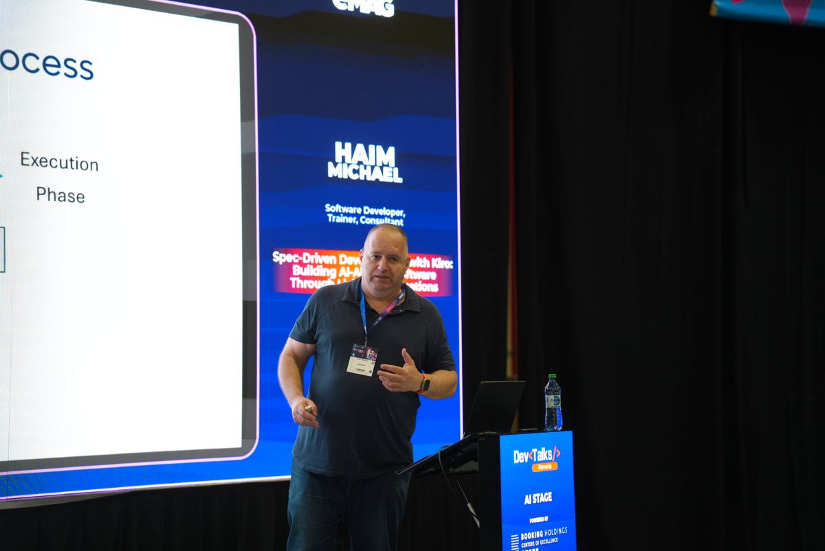 DevTalksRo's tweet photo. Thank you, Haim Michael, for bringing a fresh perspective on AI-driven software development to the AI Stage at DevTalks Romania 2026.

Through “Spec-Driven Development with Kiro”, Haim explored how living specifications, agentic IDEs, and AI-aligned workflows are changing the way modern software gets built.

One key takeaway?
The future of development is moving from writing every line manually to orchestrating systems through clear, intelligent specifications.