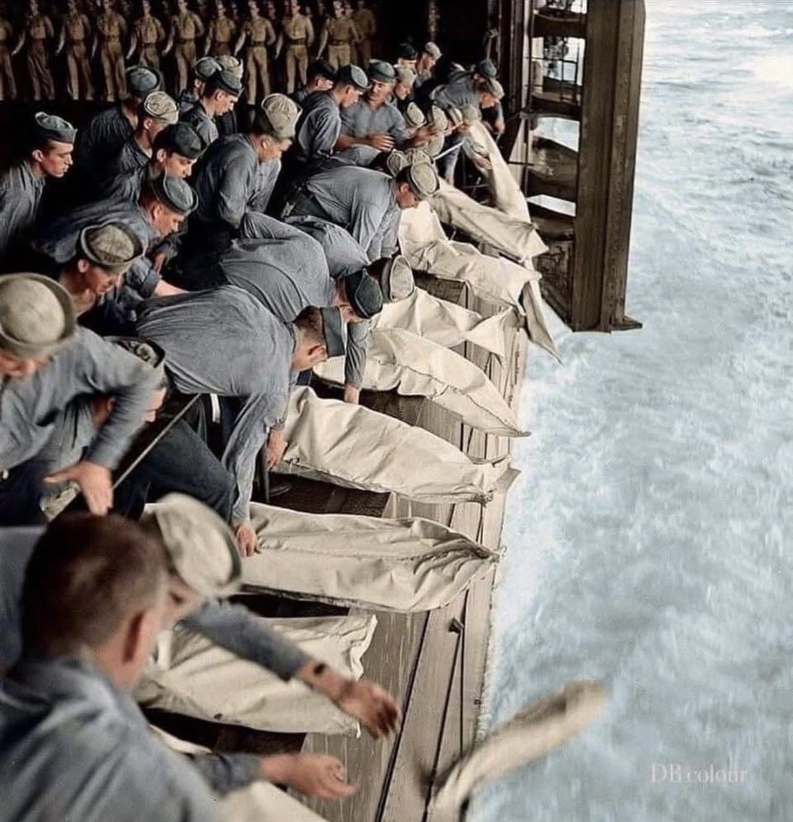 nettermike's tweet photo. This is a mass burial at sea, on the USS Intrepid in 1944 following a kamikaze attack. Remember the incredible sacrifices made on our behalf https://t.co/pcPit0vqdA