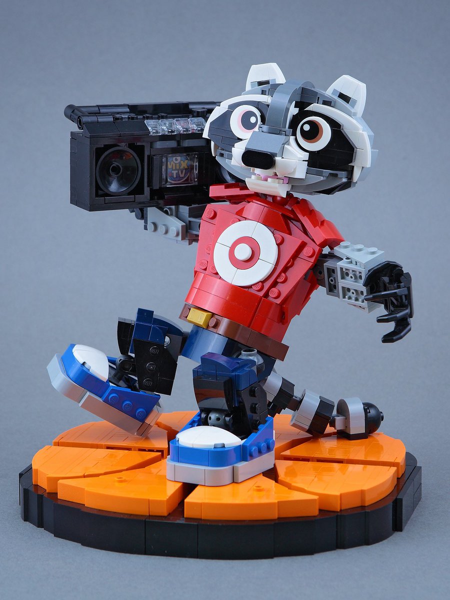 IanHou2's tweet photo. 🏀 Halftime Show: Dancing Raccoon!
As the halftime whistle blows, it’s showtime! My latest LEGO MOC captures a raccoon mascot breakdancing on an orange court, accidentally kicking over popcorn during a headspin! 🍿💥
#LEGO #LEGOideas  #basketball #mascot #raccoon #dancing https://t.co/sJdQTuHjOL