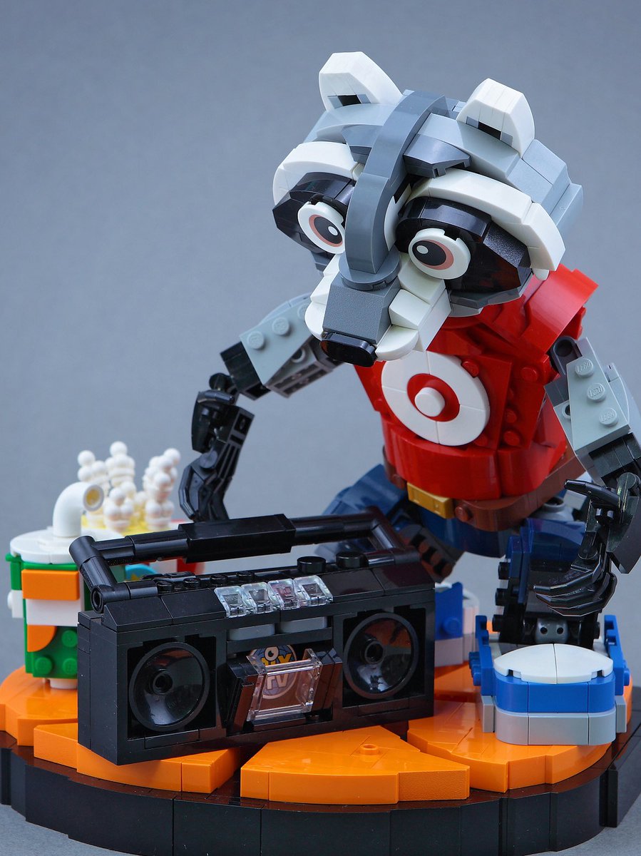 IanHou2's tweet photo. 🏀 Halftime Show: Dancing Raccoon!
As the halftime whistle blows, it’s showtime! My latest LEGO MOC captures a raccoon mascot breakdancing on an orange court, accidentally kicking over popcorn during a headspin! 🍿💥
#LEGO #LEGOideas  #basketball #mascot #raccoon #dancing https://t.co/sJdQTuHjOL