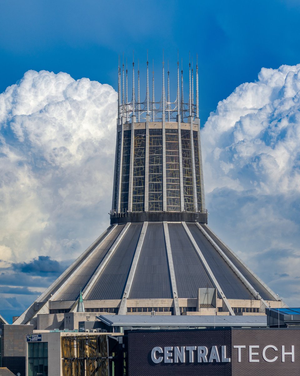 LiverpoolVista's tweet photo. Biblical clouds rolling in behind Liverpool Metropolitan Cathedral of Christ the King. https://t.co/AkwLBwiTla
