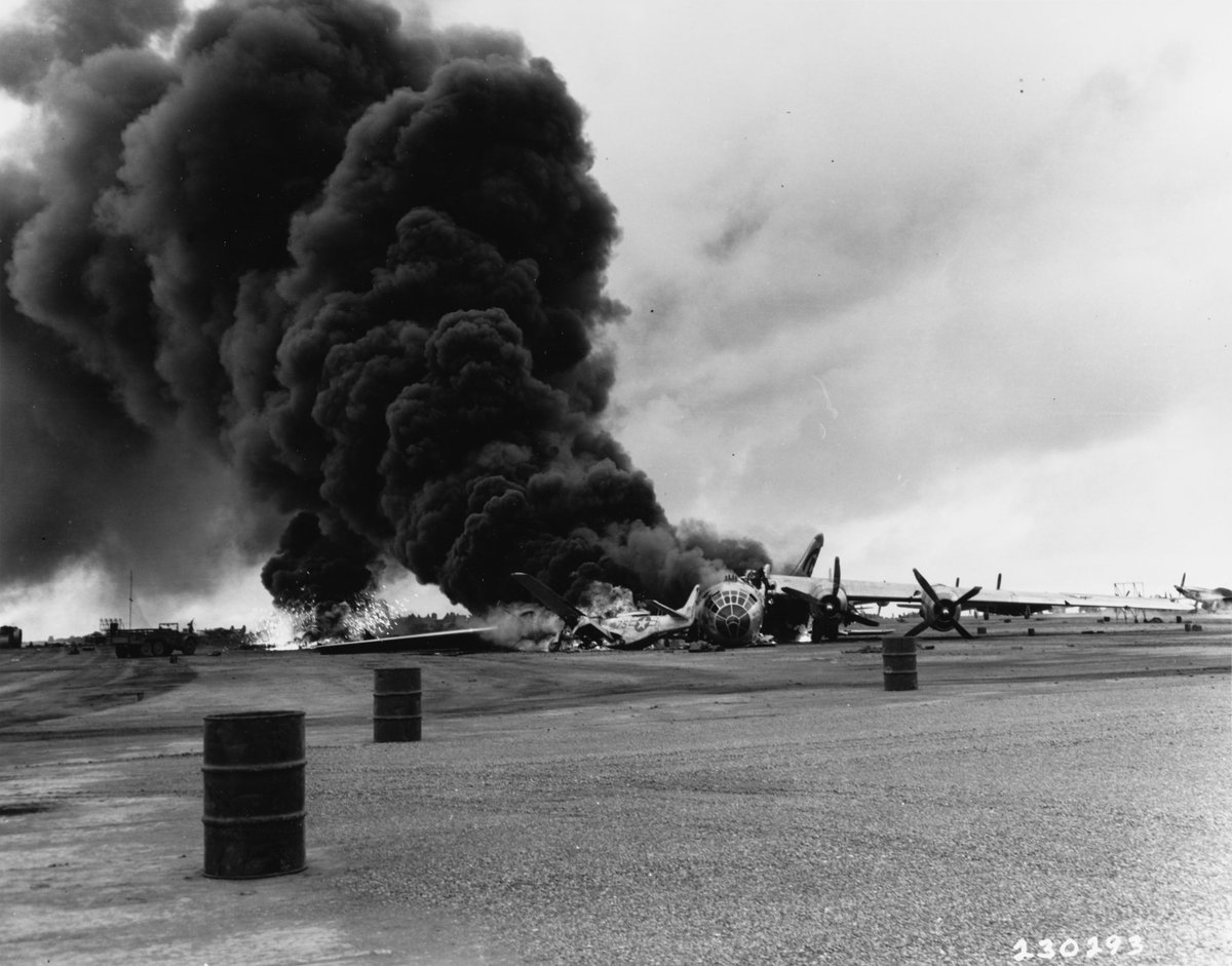 JGuybee's tweet photo. A B-29 Superfortress bomber crashing during an attempted emergency landing on Iwo Jima, 24 Apr 1945, running into nine P-51 Mustang fighters https://t.co/s3GjUamreD
