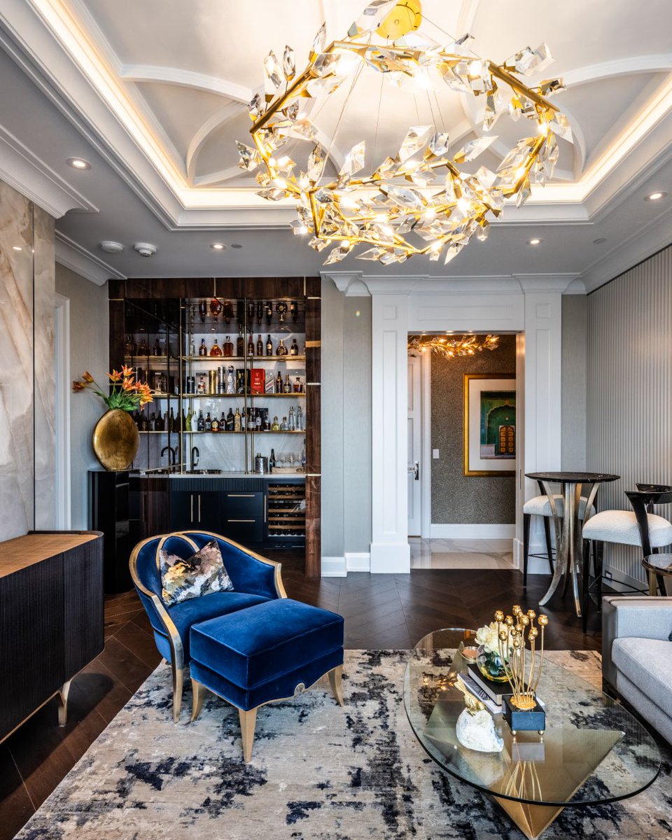 PureKitchensInc's tweet photo. Where craftsmanship meets atmosphere. ✨🥃 This custom lounge &amp; bar area blends rich wood cabinetry, illuminated shelving, and tailored storage to create a space built around how you live, host, and relax.

Let’s build your dream space: https://t.co/QEyL3rlhby https://t.co/cBTFh3LQIZ