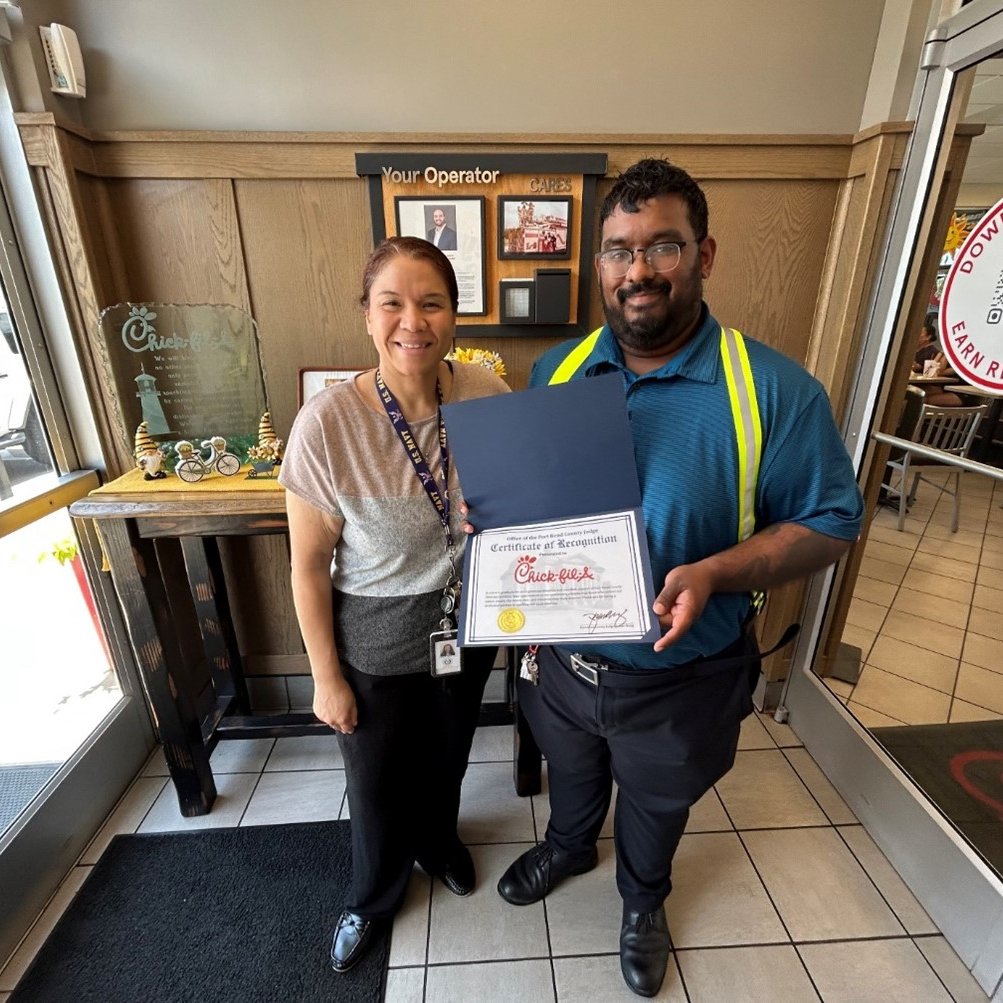 FBC_Judge's tweet photo. On June 1, 2026, Assistant Veteran Services Officer Brittney Castille presented a Certificate of Appreciation to Chick-fil-A Rosenberg’s Catering Director, Jeffrey Rodrigues, for supporting the Fort Bend County Memorial Day Ceremony. Thank you for your commitment! https://t.co/I1kaqtrhm5
