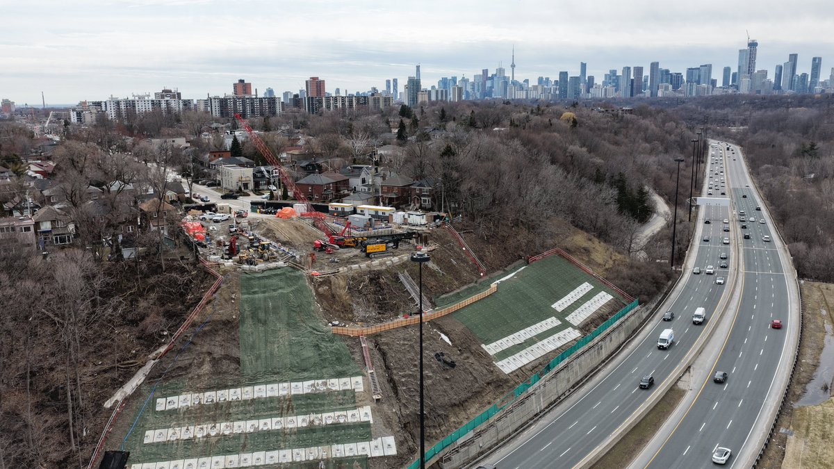 OntarioLine's tweet photo. Have you spotted our construction site on a hill? The Minton tunnel portal is coming to life - crews are working down the hillside, reinforcing and excavating the slope toward the DVP. (1/2) https://t.co/Gs9E5ytfe1