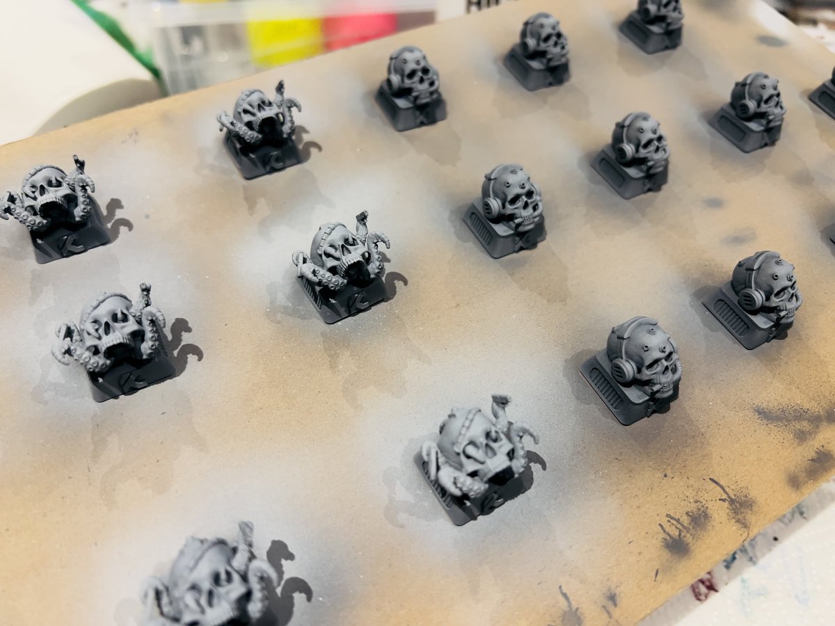 TacticalKeys's tweet photo. An entire sheet of Glocktopus™ and Deadphones™ primed, highlighted and ready for hand painting. https://t.co/OSlAzRpqJa