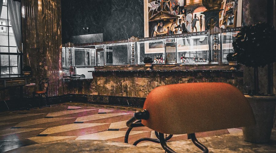 Bonecondor's tweet photo. There's something about an art deco building that just inspires me. We're leaning into the prohibition-era speakeasy theme for the peptide soiree tonight. See you soon, if you know where to find us. 🤫🧪🍸 https://t.co/n34cHHxm7Y