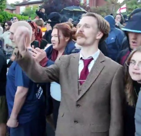 RealDanGliebitz's tweet photo. In England, patriots put on the clothes of their dead pædophile grandfather and mime the abusive act to honour the Great British tradition of Noncing. https://t.co/lJOYok3hSY