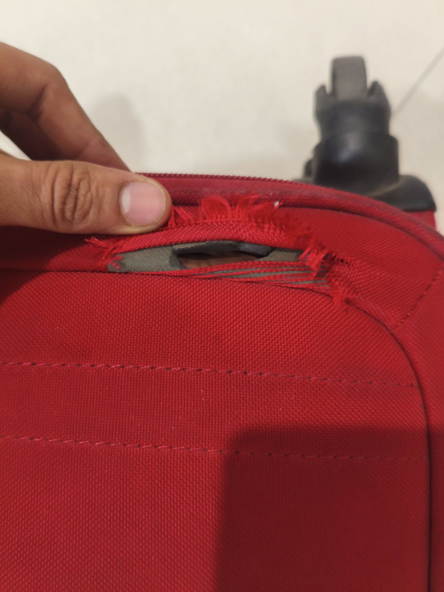 bhat_prathamesh's tweet photo. @AkasaAir My bag has been damaged while collecting it from baggage claim belt at Navi Mumbai Airport. Flight QP-2002. When raised this issue at the help desk, they told me they can't give me any resolution and told me to raise a complaint on the website. https://t.co/stdpwSCC8n