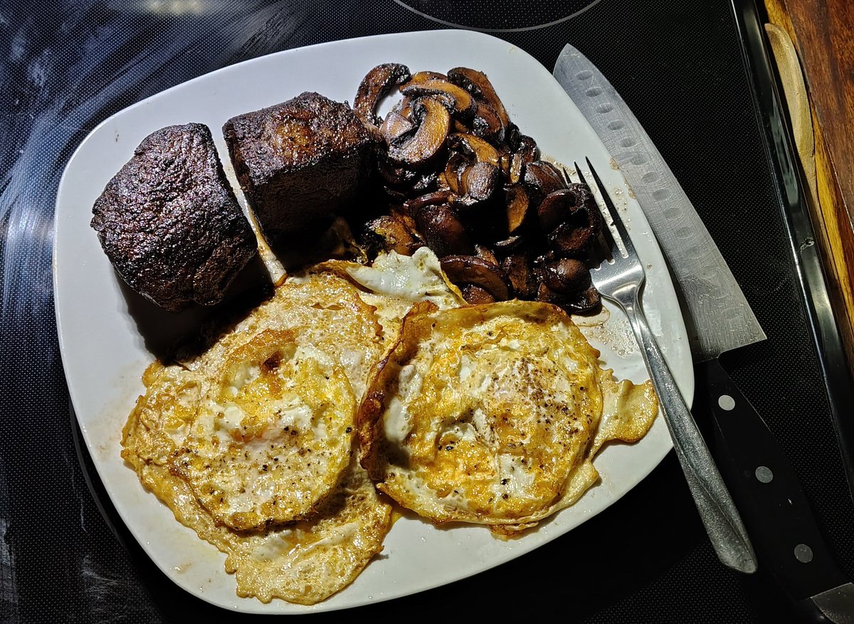 DeathMetalHero's tweet photo. Today's lunch, Medium rare steak, fried eggs and sautéed mushrooms.
Simple yet delicious. 
And the mushrooms make is all the better. Right Mush?
@RushbrookDraws https://t.co/AcOyQRXpt1