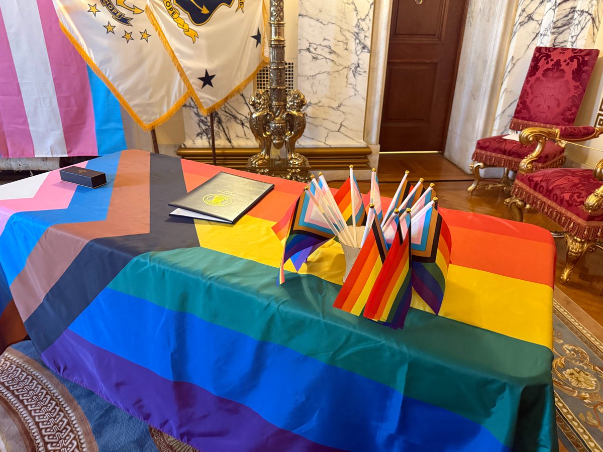 RISecState's tweet photo. Happy Pride Month, Rhode Island! 
Today, Secretary Amore joined the Governor in the State Room for the signing of a proclamation recognizing June as Pride Month. We're proud to support our LGBTQIA+ neighbors and are happy to celebrate their contributions to our state. https://t.co/cdaAPsmKyI