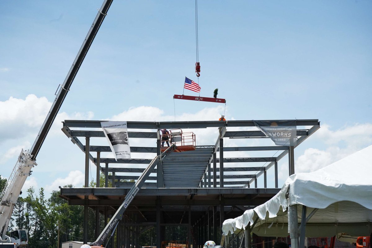 ASCTEAlabama's tweet photo. Today, we celebrated a major milestone for the Isenberg Research Institute. Hand Isenberg, ASCTE faculty and staff, the ASCTE Foundation board, and the @BrasfieldGorrie team signed the final beam before it was placed atop the structure. Exciting to see this vision continue to take shape at ASCTE. 🏗️