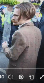Son_Of_Roisin's tweet photo. This guy is at the protest in Southampton in a full tweed suit, with his woman who he just valiantly protected at the front line against police shields, she just moved out of frame before this, he stands his ground on the front 

Respect Mr Tweed Suit Man https://t.co/khNKDtBBCx