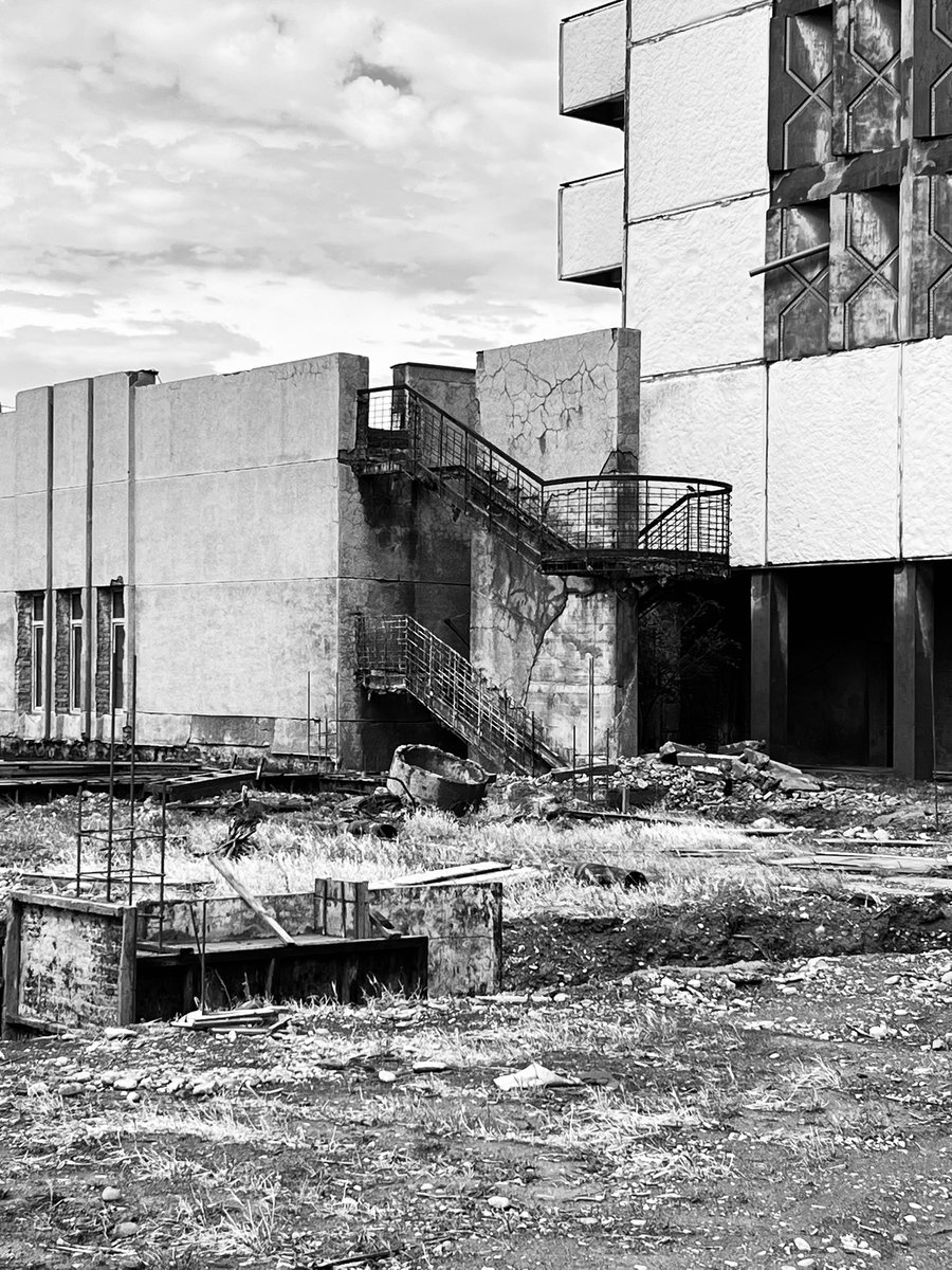 slaings's tweet photo. A derelict 70’s era hotel outside Khujand, in the north of Tajikistan. There was some renovation work being done on it so perhaps it’ll be coming back in some way. https://t.co/BTDlgzDWmf