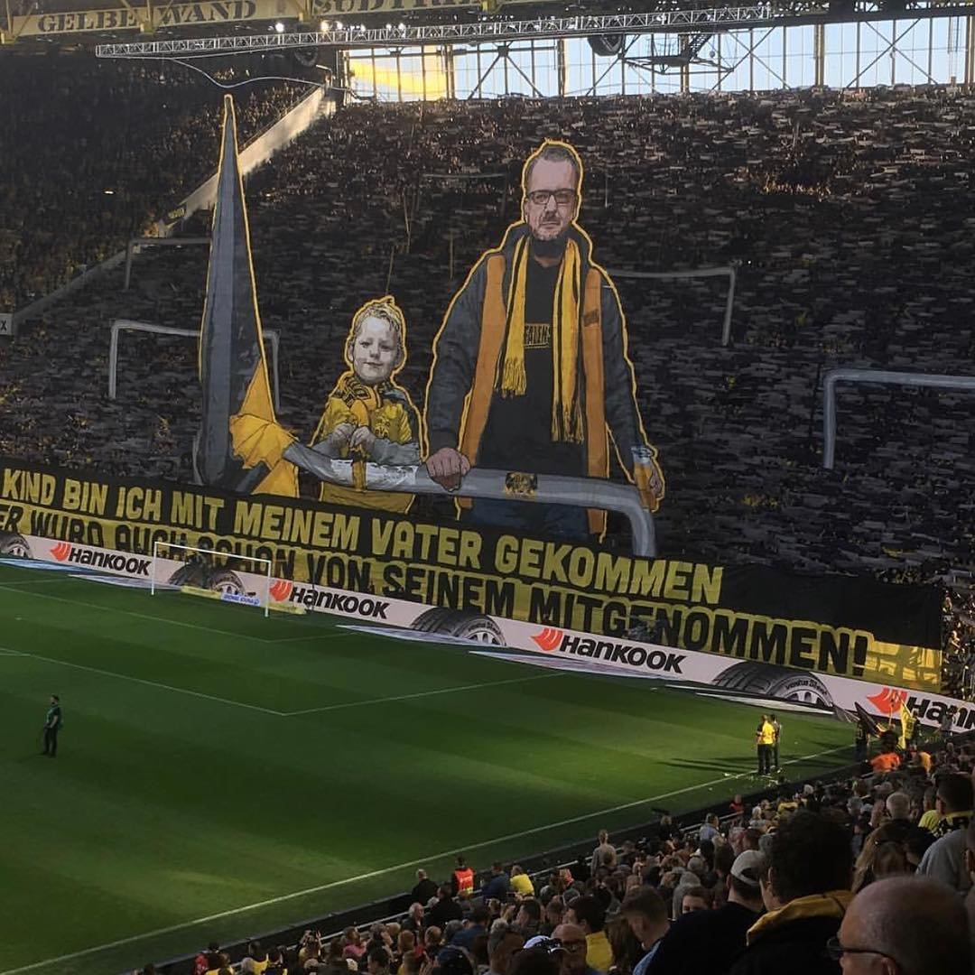 theawayfans's tweet photo. “As a kid, I came with my dad. 
And he was brought along by his too.” 

Dortmund display 👏 https://t.co/O7vE4dExDz