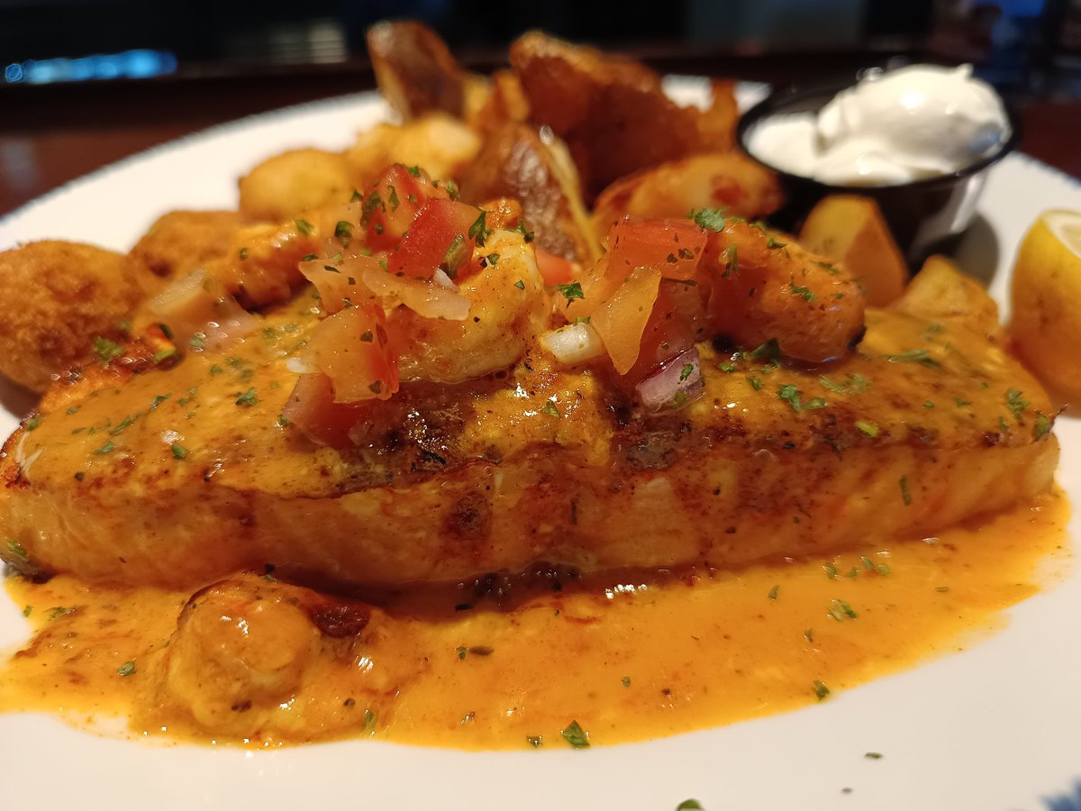 RLLoverJoe's tweet photo. Salmon New Orleans: Fresh blackened salmon topped with shrimp in a Cajun butter sauce, with tomato-cilantro relish. Crispy potatoes &amp; hush puppies @RedLobster Georgesville Rd #RedLobster Columbus Ohio https://t.co/caybLxKvvN