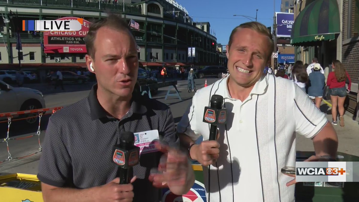KevinLighty's tweet photo. I'm not jealous at all that @glenn_kinley and @TristanThomasTV are at @ofcwrigleyfield tonight. Tristan looks like he's saying "sorry bout ya". https://t.co/zRXl5Ku2y0