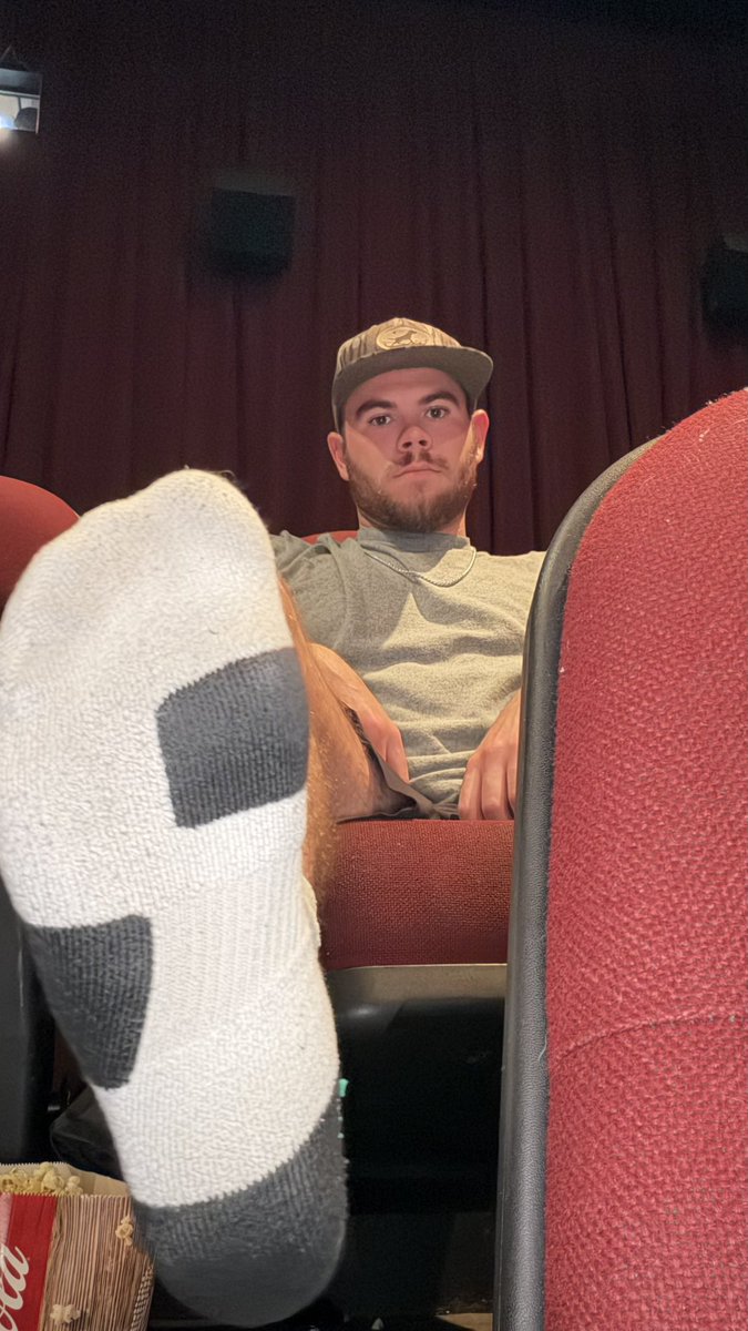 FootMasterBuck's tweet photo. POV: You picked the seat in front of the alpha with stinky feet… Enjoy your movie loser https://t.co/Sulyn0szLR